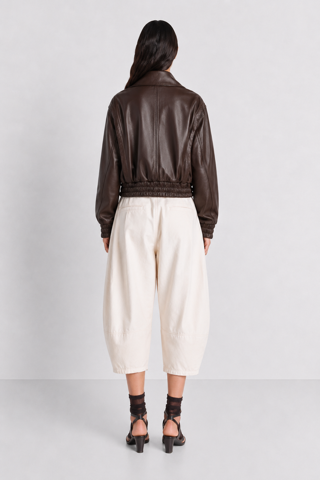 The Dark Brown Leather Bomber — model back view