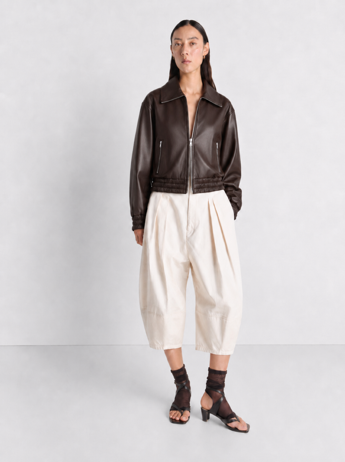 The Dark Brown Leather Bomber — model front view